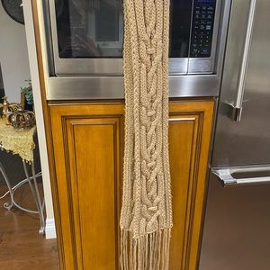 Long, thick, cable knit scarf